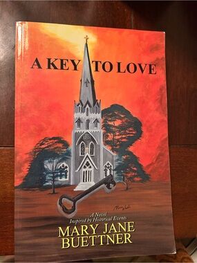 A Key to Love by Mary Jane Buettner - Orange & Gray Book Cover